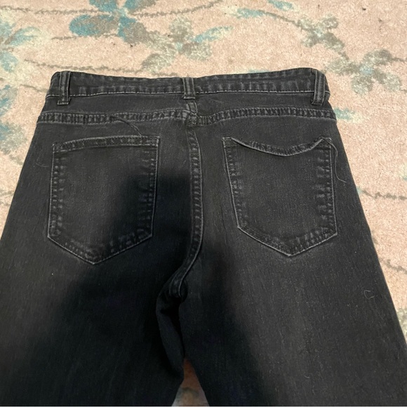 Black distressed jeans with rips on the knees and a button fly - Picture 5 of 6
